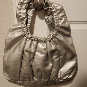 Women's Fashion Express silver purse.